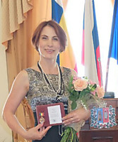 Елена Николаевна Абраменко - хореограф, главный балетмейстер Ростовской государственной филармонии, солистка Государственного ансамбля донских казаков им. Квасова, Заслуженная артистка республики Дагестан - Ростов-на-Дону.